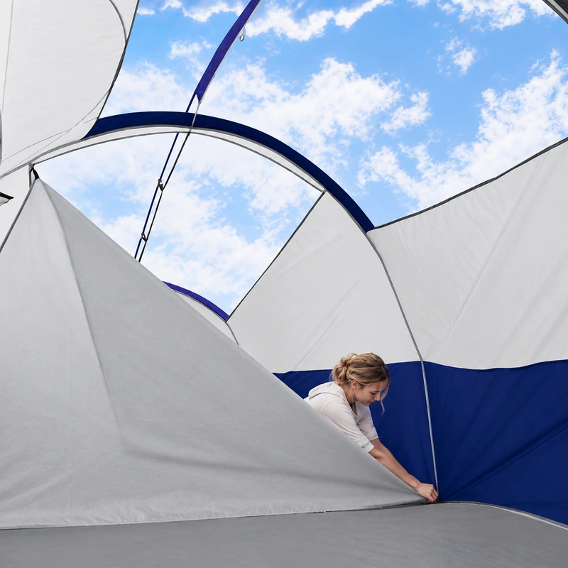 Interior divider curtain of a family tent with a fictional adult model
