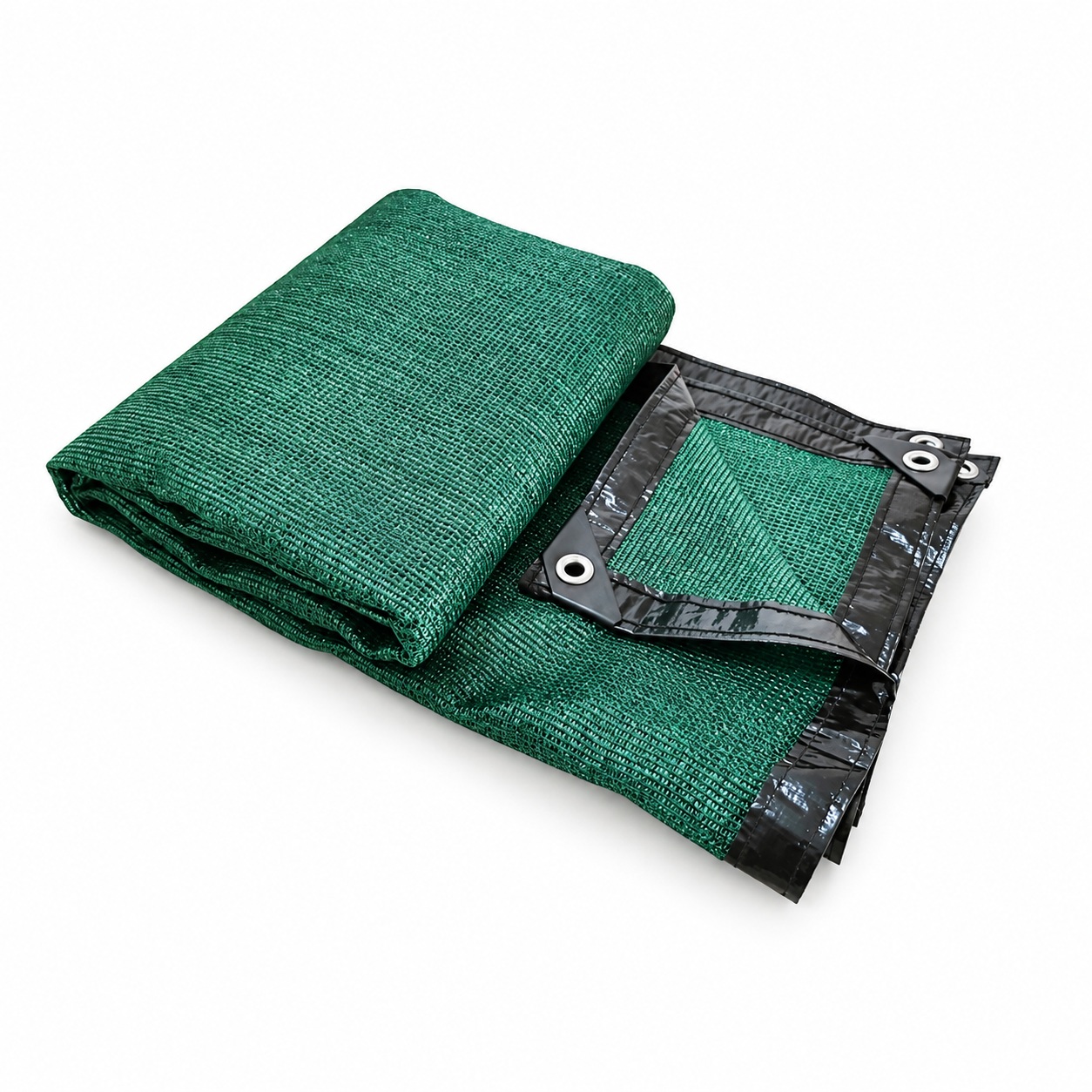 Folded green mesh privacy screen with dark reinforced edges and metal corner grommets.
