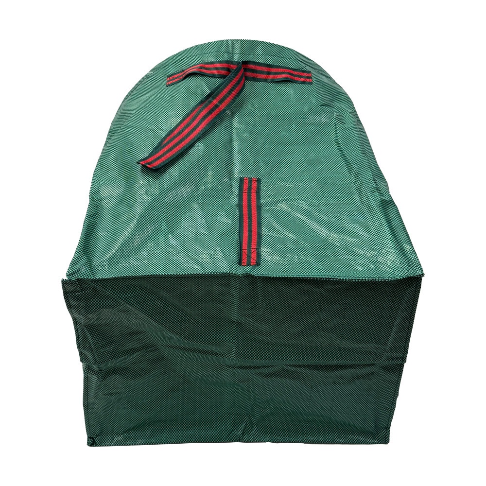 Green flexible leaf collection bag with red and black webbing handles.