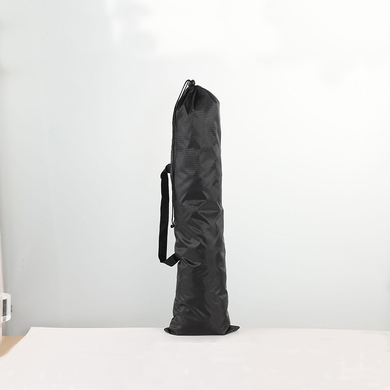 Tall black drawstring chair carry bag with a shoulder strap.